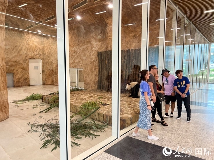 當(dāng)?shù)赜慰团c“四?！焙嫌?。人民網(wǎng)記者 張志文攝