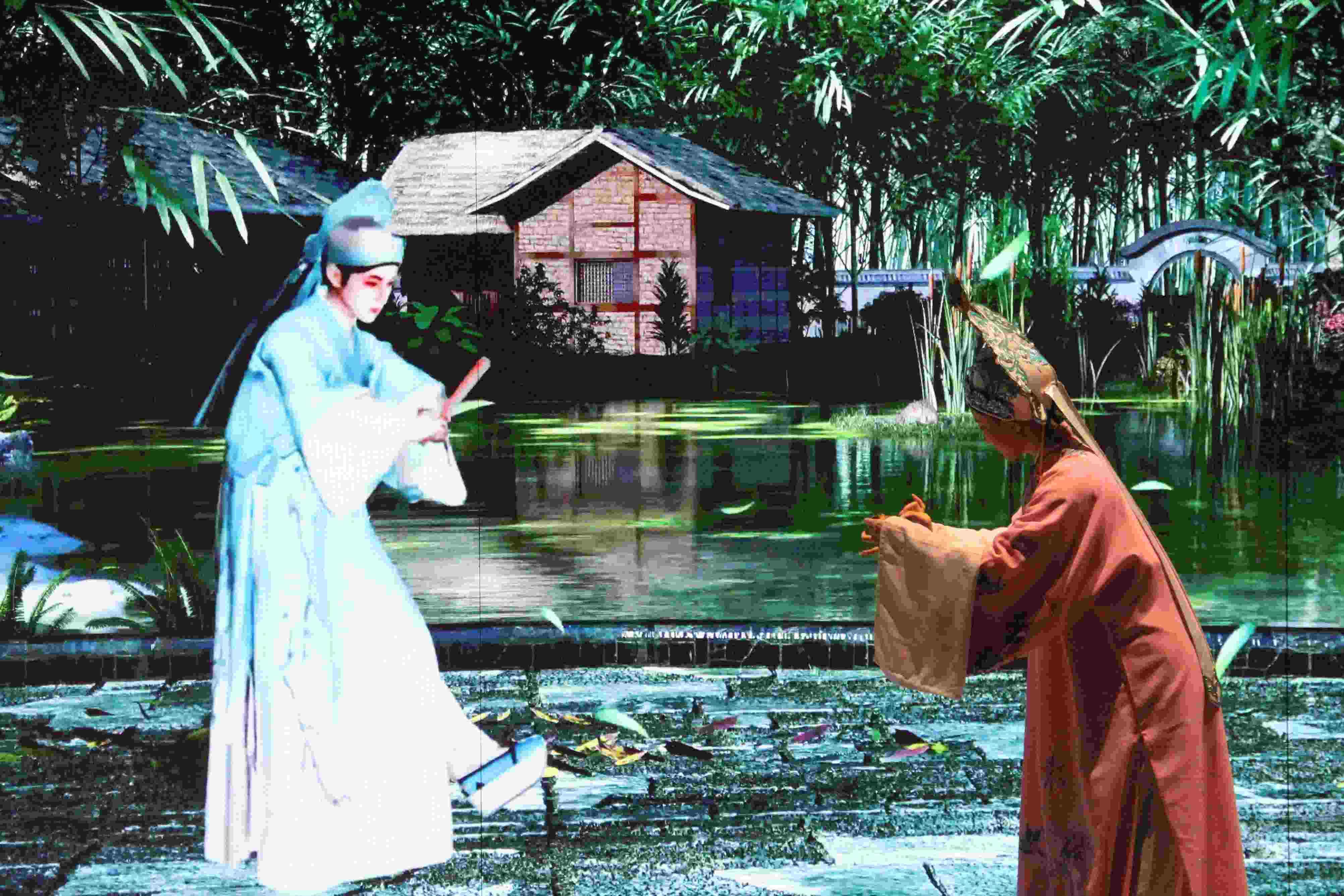 真人演員與虛擬人演員在“元啟金陵”南京數(shù)字文化客廳出演《梁山伯與祝英臺(tái)》經(jīng)典選段。受訪者供圖