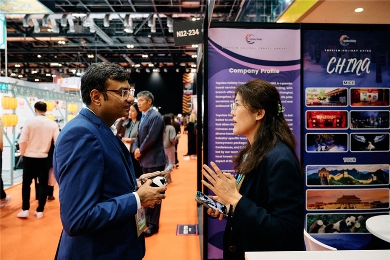 “中國(guó)館”展區(qū)現(xiàn)場(chǎng)洽談。 楊浩鵬攝