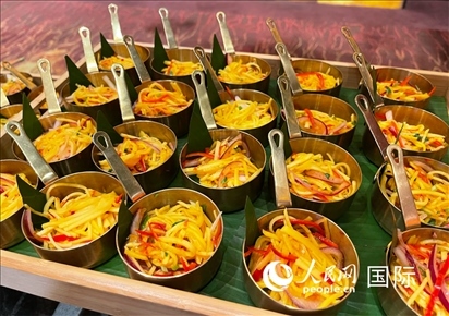 馬來西亞美食節(jié)現(xiàn)場準備的美食。人民網(wǎng) 王婧攝