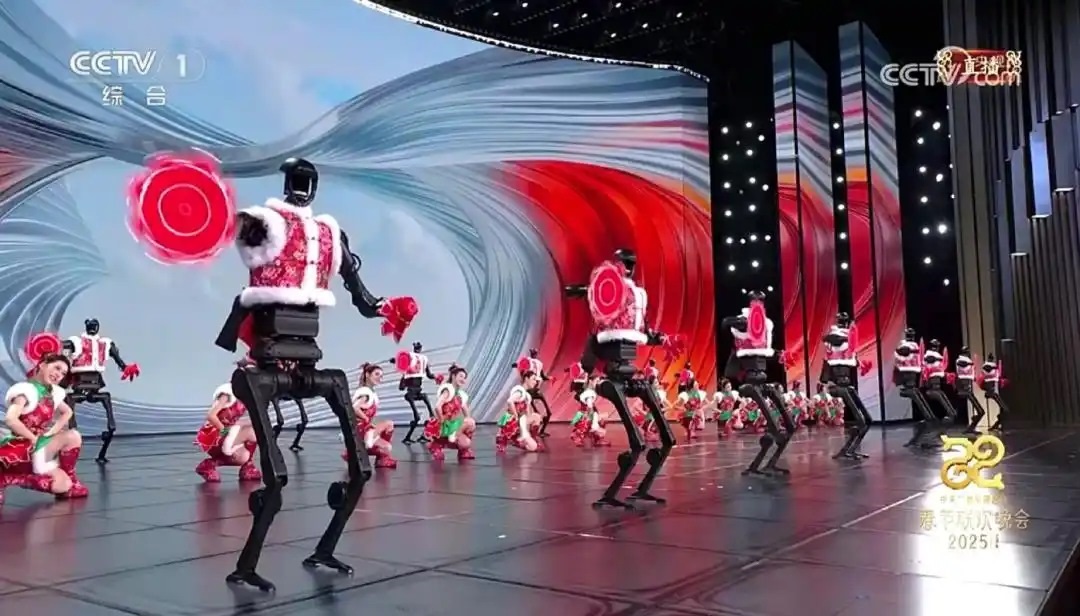 △今年春晚，宇樹科技人形機(jī)器人身穿東北特色的花棉襖扭秧歌，呈現(xiàn)出全新視覺效果。