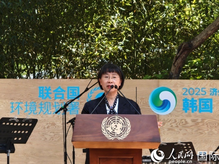 周國(guó)梅致辭。人民網(wǎng)記者 李明攝